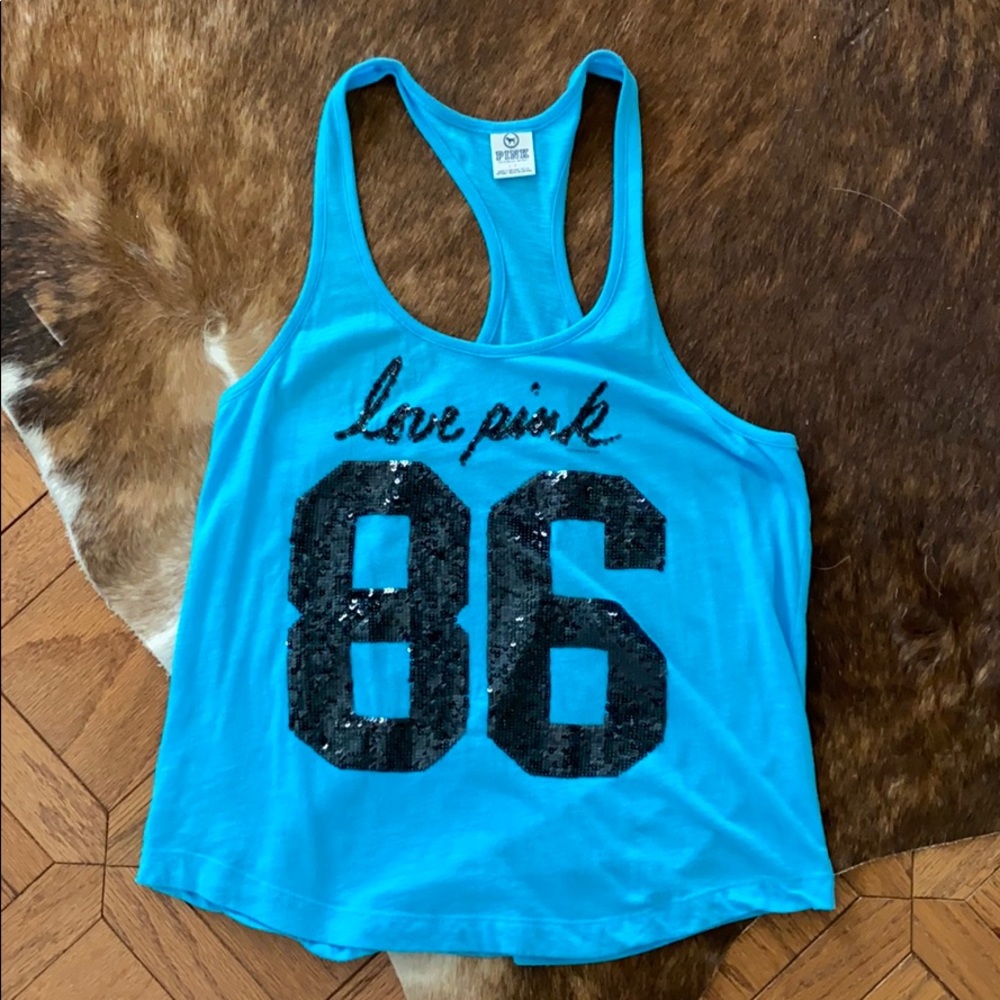 Pink tank top.